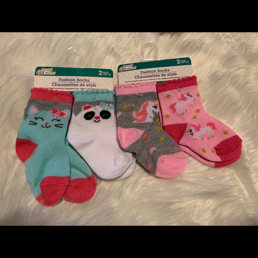 4 brand new baby socks